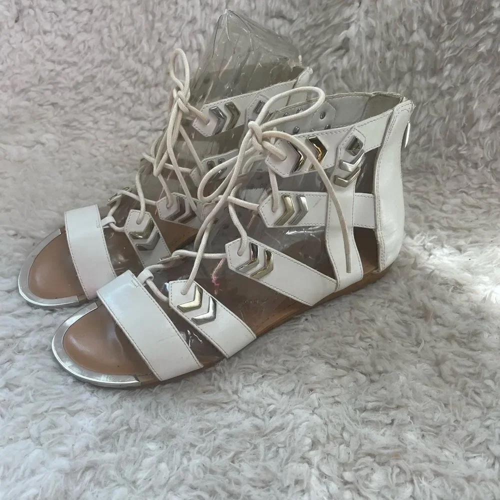 Fergie gladiator synthetic white lace up sandals with silver tone accents SZ 10